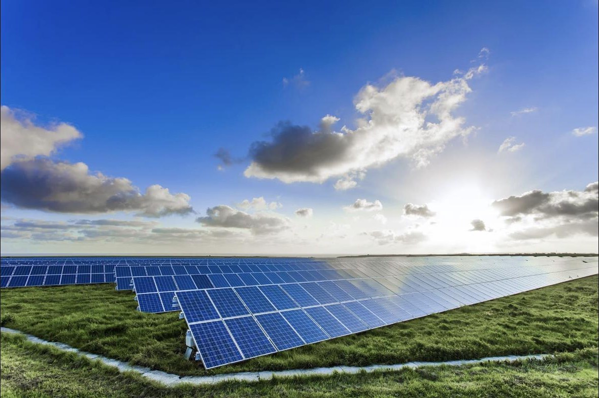 Photovoltaic field under a blue sky